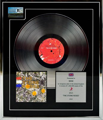 Lot 14 - THE STONE ROSES; a platinum disc presented to...