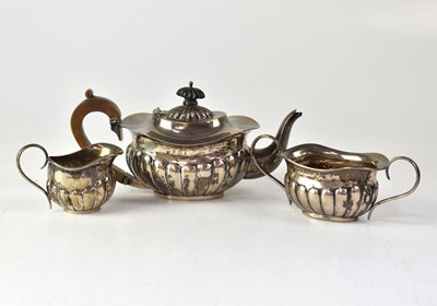 Lot 549 - An Edwardian hallmarked silver three-piece tea...