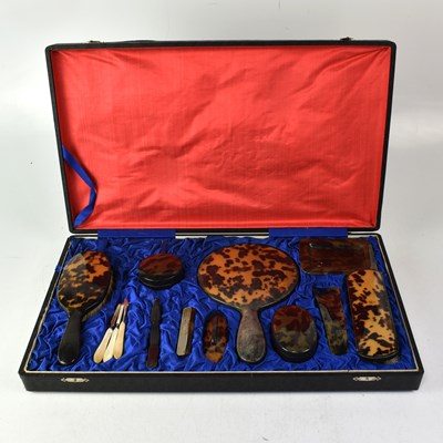 Lot 183 - A cased set of faux tortoiseshell dressing...