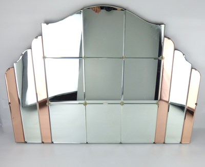 Lot 49 - An Art Deco shaped clear and copper toned panelled wall mirror