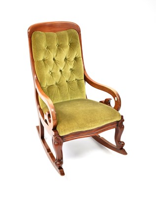 Lot 66 - A Victorian mahogany rocking chair, button...