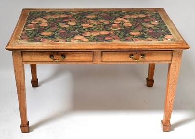 Lot 41 - An early 20th century oak table with two...