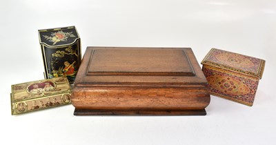 Lot 142 - An oak box with panelled lid above a bombé...