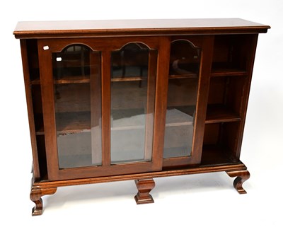 Lot 25 - A mid-20th century mahogany glazed bookcase...