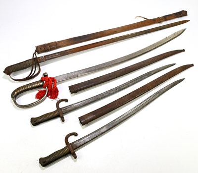 Lot 456 - An early 20th century dress sword with leather...