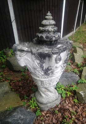 Lot 114 - A pair of composite stone fountains (2)....