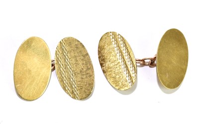 Lot 338 - A pair of 9ct yellow gold oval cufflinks with...