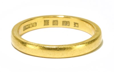 Lot 82 - A 22ct yellow gold wedding band, size K,...