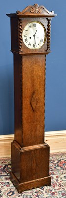 Lot 2313 - An early 20th century oak cased longcase clock...
