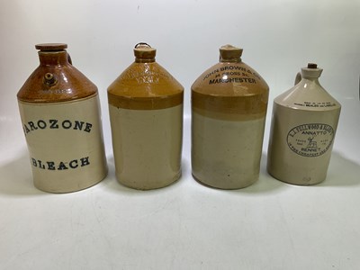 Lot 2091 - Four stoneware flagons to include an example...
