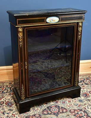 Lot 2429 - A 19th century ebonised pier cabinet with...