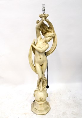 Lot 122 - A fibreglass standard lamp in the form of a...