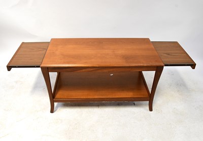 Lot 21 - A retro teak two-tier coffee table with two...