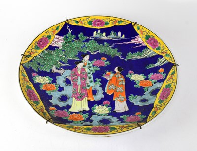 Lot 326 - A contemporary Chinese blue ground charger...