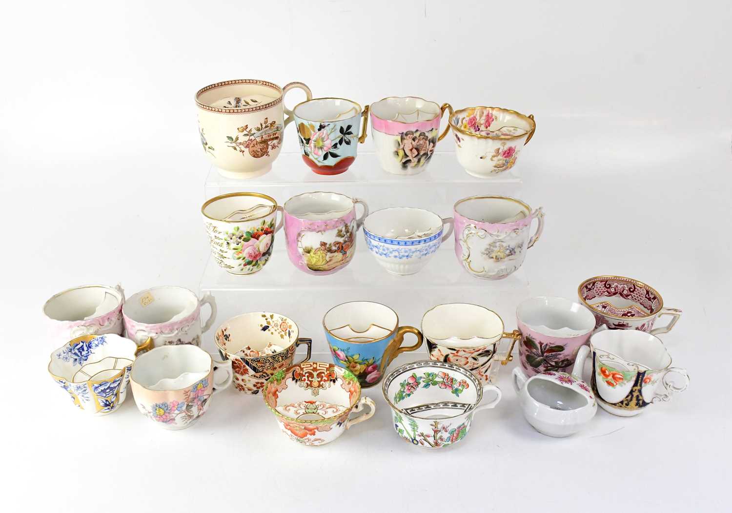 Lot 268 - A collection of moustache cups including...