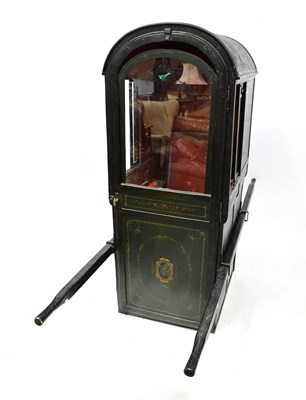 Lot 115 - A circa 1865 French sedan chair with green...