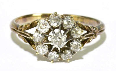 Lot 36 - An 18ct yellow gold and ten stone diamond set...