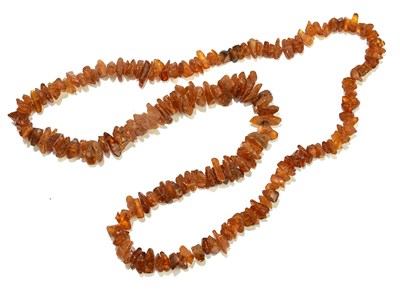 Lot 385 - A rough cut amber necklace.