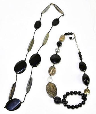 Lot 407 - Two polished hardstone contemporary necklaces (2)
