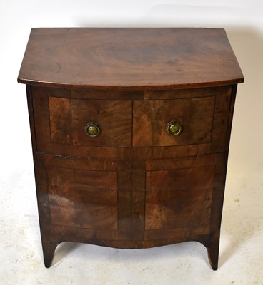 Lot 1576 - A 19th century mahogany bowfront commode in...