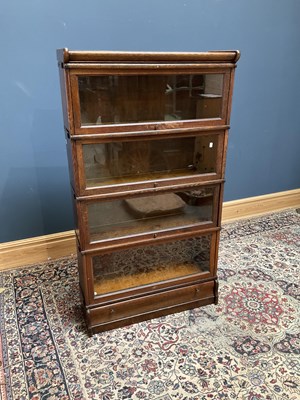 Lot 2441 - A metal bound oak and stained pine four-tier...