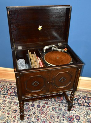 Lot 2156 - APOLLO; an early 20th century oak cased...