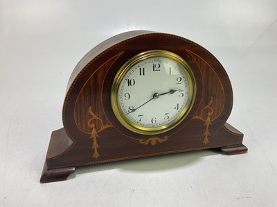 Lot 2289 - A mahogany inlaid mantel clock, with white...