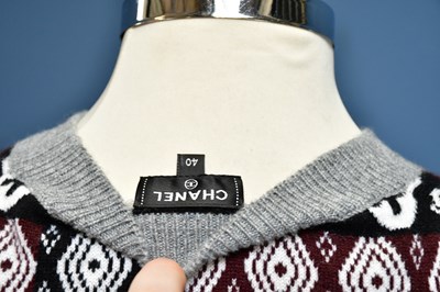 Lot 731 - CHANEL; an unused 100% cashmere snow flake...
