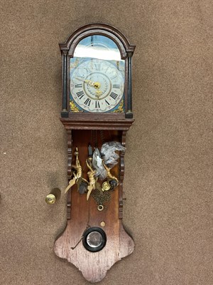 Lot 204 - A circa 1900 Dutch oak wall clock with painted...