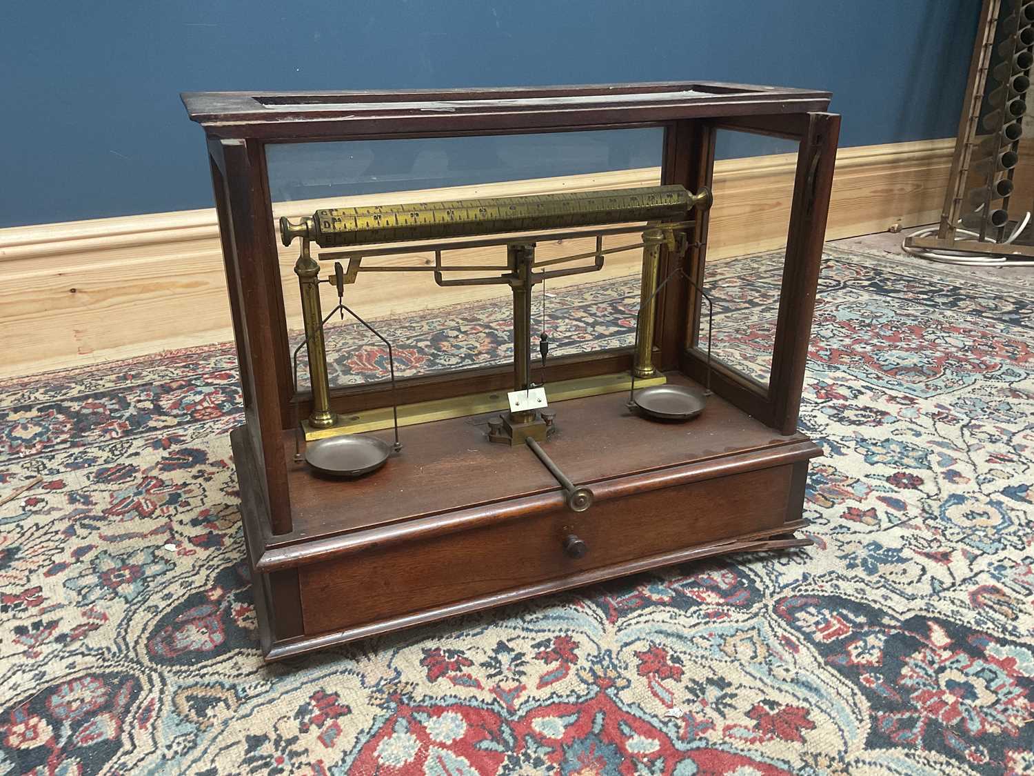 Lot 2175 - A mahogany cased set of balance scales,