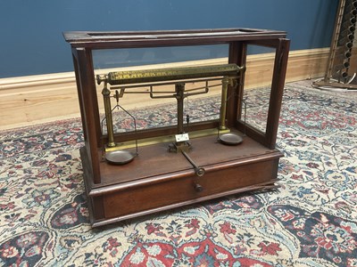 Lot 2175 - A mahogany cased set of balance scales, 42cm x...