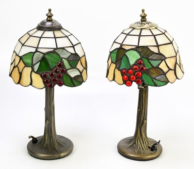 Lot 213 - A pair of modern table lamps with Tiffany...