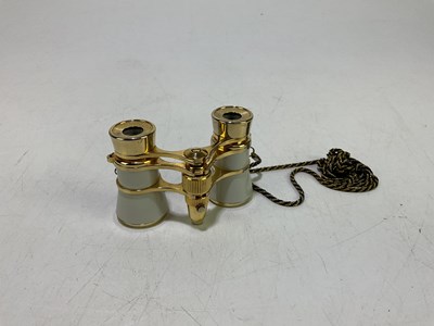Lot 2059 - A pair of modern white and gilt metal opera...