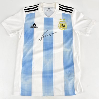 Lot 2202 - LIONEL MESSI; a signed Argentina shirt, signed...