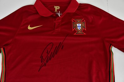 Lot 2190 - CRISTIANO RONALDO; a signed Portugal shirt,...