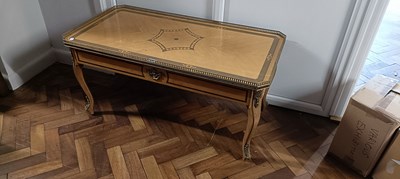 Lot 2507 - A reproduction walnut and gilt metal coffee...