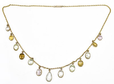 Lot 225 - An Edwardian 9ct yellow gold aquamarine,...