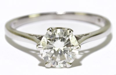 Lot 6 - An 18ct white gold diamond solitaire ring, the...