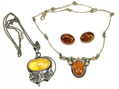 Lot 267 - A silver and amber set pendant on chain,...