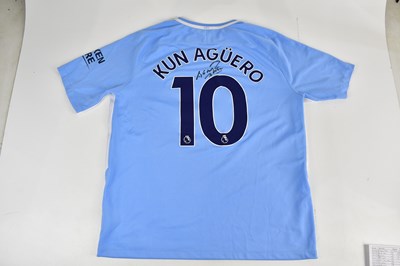 Lot 2198 - SERGIO AGUERO; a signed Manchester City shirt,...