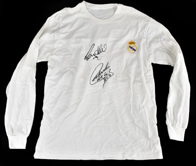 Lot 2200 - REAL MADRID; a retro style shirt, signed by...