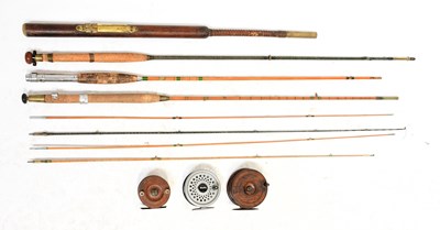 Collection of vintage fishing rods in a rod holdall. Four in lot