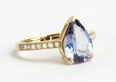 Lot 71 - A 14ct yellow gold tanzanite and diamond ring,...