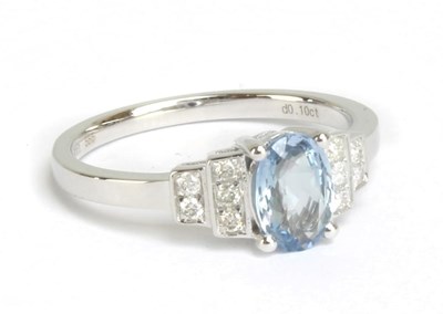 Lot 75 - A 14ct white gold sapphire and diamond ring,...