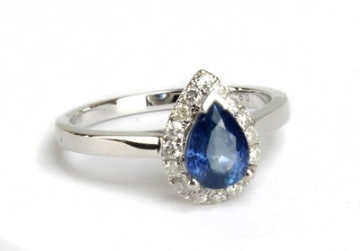 Lot 76 - A 14ct white gold sapphire and diamond ring,...