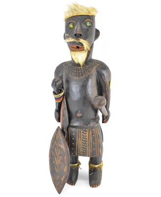 Lot 209 - A South Pacific style carved wood warrior...