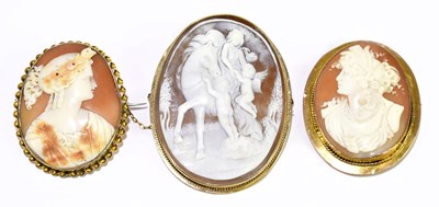 Lot 298 - Three 9ct yellow gold framed oval cameo...