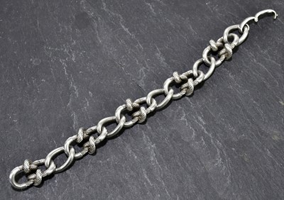 Lot 199 - GEORG JENSEN; a heavy textured silver bracelet,...