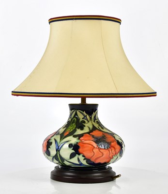 Lot 137 - MOORCROFT; an 'Anemone' pattern lamp with...