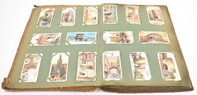 Lot 289 - A cigarette card album containing approx two...